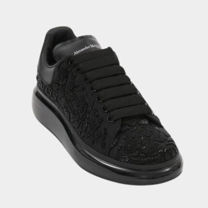 Alexander McQueen baskets noires homme détail semelle signature Oversized